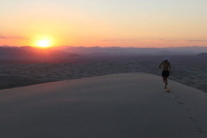 Man running in the Mojave Desert.