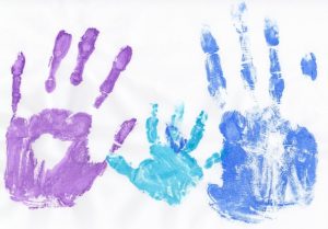 Colorful handprints of a family