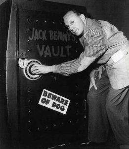Jack Benny preparing to enter the vault at his home.