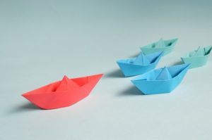 Origami boats in different colors.
