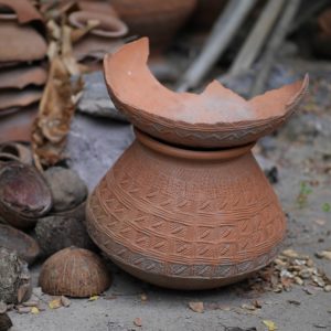 A broken clay pot.