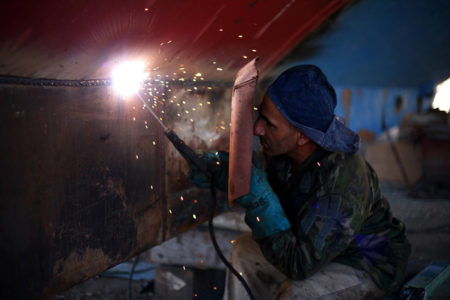 A man welding.